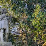 Image of an angel statue with crossed arms
