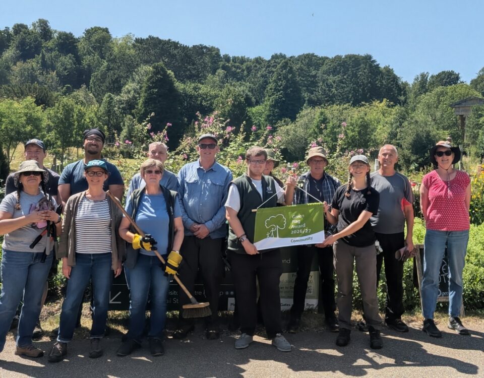 Volunteers at Arnos Vale Cemetery with the Green Flag Community Award