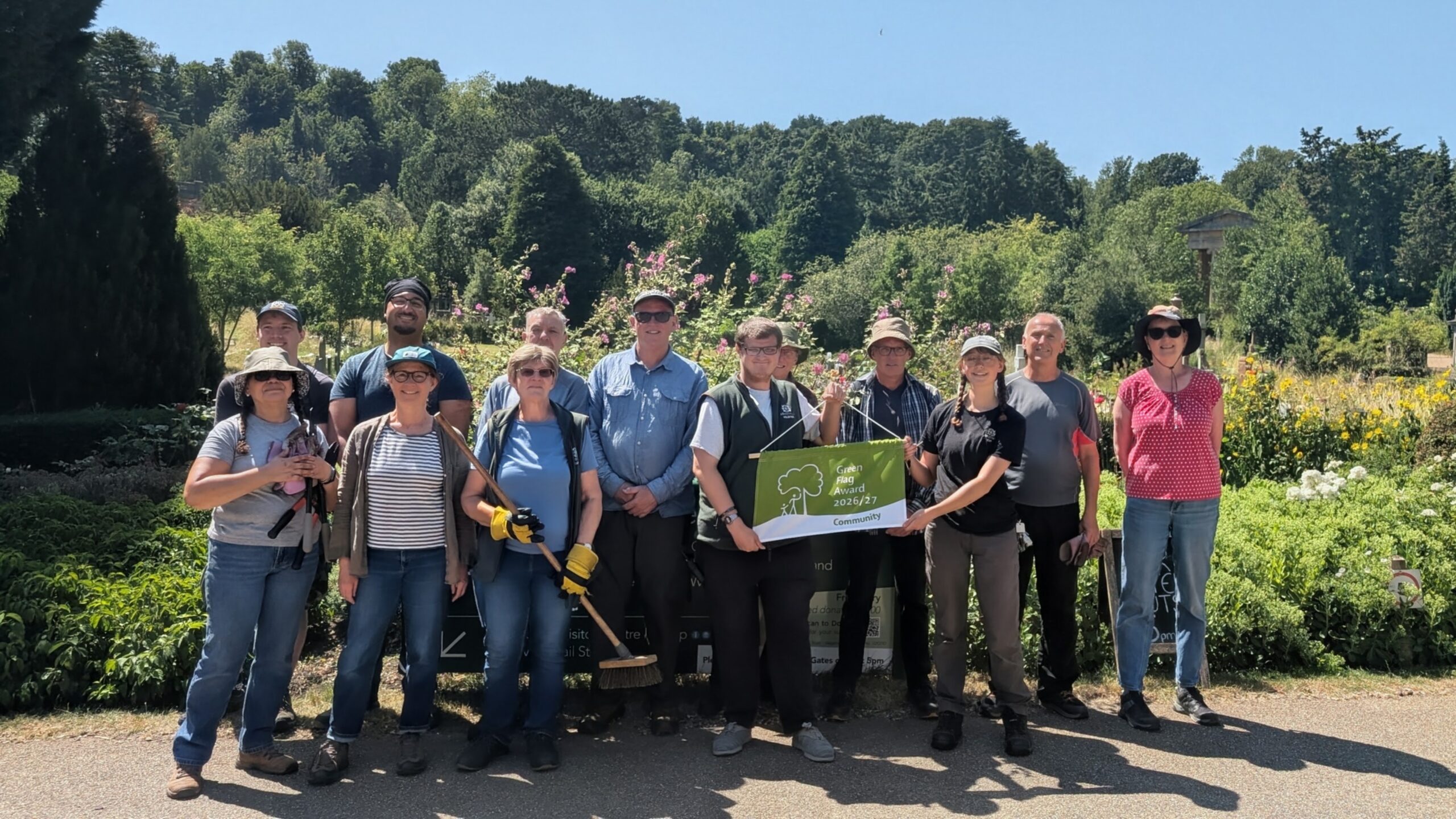 Volunteers at Arnos Vale Cemetery with the Green Flag Community Award